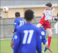  ??  ?? Louis McKeown, Rock Celtic heads the ball towards the Glenmuir United goal.