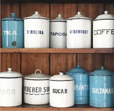  ?? JESSE LAUZON PHOTOS ?? Enamelware canisters. Jesse Lauzon says that while you may have a colour in mind while shopping, be open to surprises.