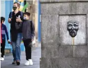  ?? DAVID CHESKIN AP ?? Tourists roam the normally busy Royal Mile in Edinburgh, Scotland on Aug. 21.