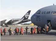  ?? Mark Baker / Associated Press ?? Staff board a U.S. Air Force transport in Christchur­ch, New Zealand, to fly to Antarctica.