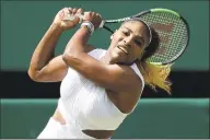  ?? Ben Curtis / Associated Press ?? Serena Williams returns to Barbora Strycova during a singles semifinal match at Wimbledon on Thursday.