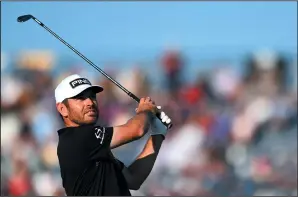  ?? GLYN KIRK/AFP VIA GETTY IMAGES ?? South Africa's Louis Oosthuizen tees off from the 16th during the second round of The 149th British Open at Royal St George's, Sandwich in south-east England on Friday.