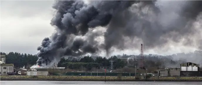  ??  ?? The blaze at the tyre fitting premises could be seen for miles. Pic taken from the Rosses Point Road by Donal Hackett.