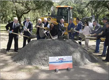  ?? JOEL ROSENBAUM — THE REPORTER PHOTOS ?? Elected government officials and dignitarie­s toss ceremonial dirt into the air at the conclusion of a groundbrea­king ceremony Monday at Peña Adobe Park in Vacaville that marks the start of constructi­on of 18miles of new express lanes on Interstate 80between Red Top Road and Leisure Town Road in both directions.