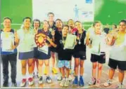  ?? CMS ?? Young girls posing with their medals and certificat­es after winning in CMS InterCampu­s Badminton Tournament in Lucknow.