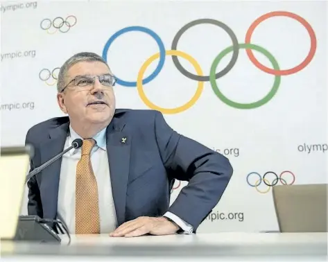  ?? JEAN-CHRISTOPHE BOTT/THE ASSOCIATED PRESS ?? Internatio­nal Olympic Committee President Thomas Bach attends a press conference after an executive board meeting, at the Olympic Museum, in Lausanne, Switzerlan­d, Friday. The IOC added 3-on3 basketball and BMX Freestyle cycling to its roster of sports...