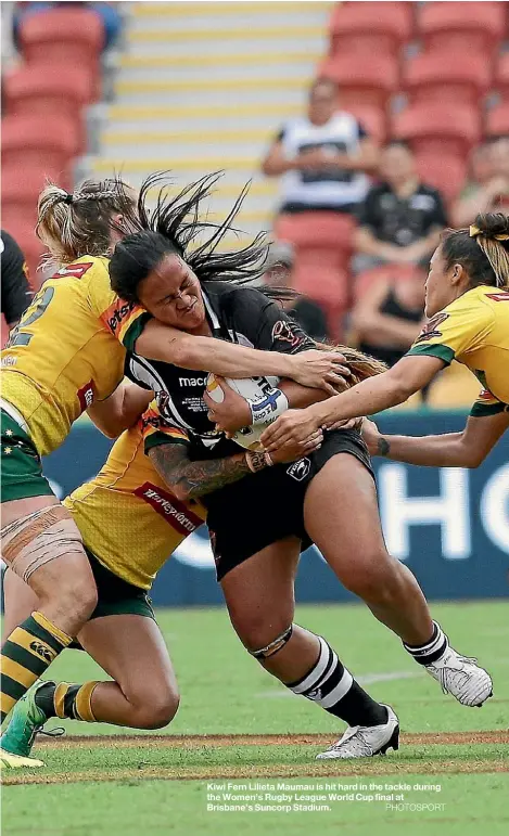  ??  ?? Kiwi Fern Lilieta Maumau is hit hard in the tackle during the Women’s Rugby League World Cup final at Brisbane’s Suncorp Stadium.