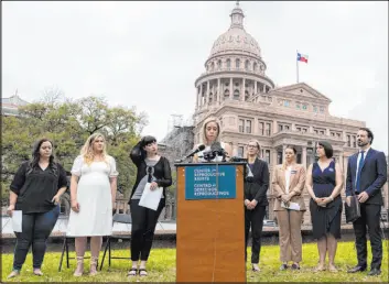  ?? Sara Diggins The Associated Press ?? Amanda Zurawski, speaking in front of the Texas State Capitol in Austin on Tuesday, is one of five plaintiffs suing the state of Texas over its “confusing ” abortion law.