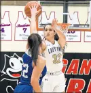  ?? /ANDY LAVALLEY / POST-TRIBUNE ?? North Judson’s Lillian Frasure (32) shoots over a Tipton player during the Class 2A Logansport Semistate game on Saturday.