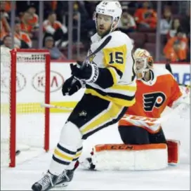  ?? TOM MIHALEK — THE ASSOCIATED PRESS ?? Flyers’ goalie Michal Neuvirth couldn’t do much about this Riley Sheahan goal in the third period of a long-since decided Game 4 disaster Wednesday. But the back-up goalie could be the only one capable of saving a playoff campaign careening toward an...