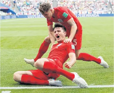  ?? REUTERS ?? England’s Harry Maguire celebrates scoring the team’s first goal with John Stones.