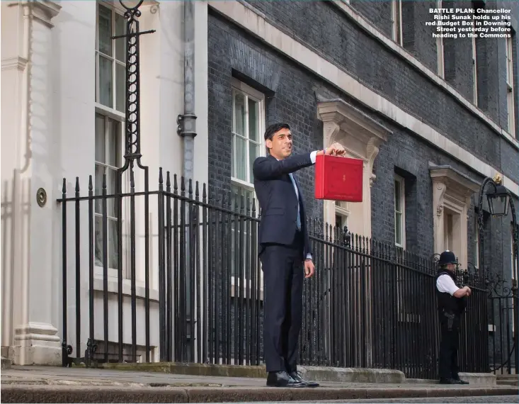  ??  ?? BATTLE PLAN: Chancellor Rishi Sunak holds up his red Budget Box in Downing Street yesterday before heading to the Commons