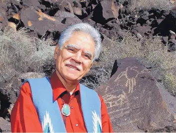  ?? DEAN HANSON/JOURNAL ?? New Mexico author Rudolfo Anaya in front of the Petroglyph­s on Albuquerqu­e’s West Side. The acclaimed author died on Sunday. He was 82.