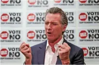  ?? RINGO H.W. CHIU/ASSOCIATED PRESS ?? California Gov. Gavin Newsom gives a TV interview Sunday before a rally in Sun Valley, Calif., for a recall election against him.