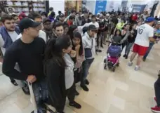  ?? RICK MADONIK/TORONTO STAR ?? By mid-afternoon Saturday, 600 people had entered the new OVO store at Yorkdale Mall, with hundreds more lined up outside waiting to get in.