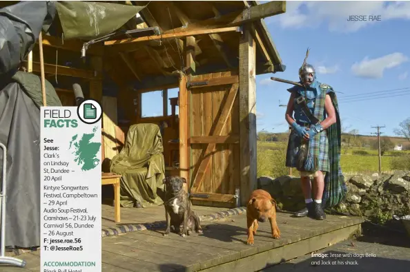  ??  ?? Image: Jesse with dogs Bella and Jock at his shack.