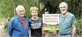  ?? ?? MANY MILES: Between them, three Makhanda athletes have completed more than 1,000 parkruns over the years, and they were back in Makana botanical gardens on Saturday, ready to add to their totals as triple centurions. Stavie van Aardt, left, has 379 parkruns to his credit, Lynne Marshall, centre, has 351 and Peter Stockwell, right, has 377. The 5km parkruns are held at 8am each Saturday from the entrance to the botanical gardens in Lucas Avenue.