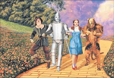  ?? ?? Ray Bolger (Scarecrow), Jack Haley (The Tin Man), Judy Garland (Dorothy Gale), and Bert Lahr (The Cowardly Lion) in The Wizard Of Oz film from 1939.