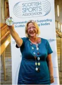  ??  ?? Salute Linda is delighted to be named Scottish Sporting Champion