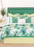  ?? EASTERN ACCENTS ?? Bold greens make a statement in the Tropical Dreams Bedset by Celerie Kemble for Eastern Accents.