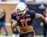  ?? BUTCH DILL / ASSOCIATED PRESS ?? National squad linebacker
Ivan Pace Jr. of Cincinnati runs drills during practice for the
Senior Bowl Wednesday, in Mobile, Ala.