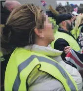  ??  ?? Pro-Brexit ‘yellow vest’ protesters — some of