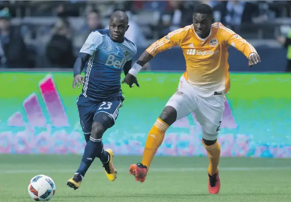  ?? DARRYL DYCK/ THE CANADIAN PRESS ?? Like many of his teammates, Vancouver Whitecaps winger Kekuta Manneh, left, is still looking for his first goal after eight games of the MLS season.