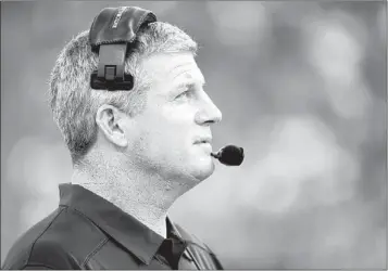  ?? MICHAEL KEATING/ASSOCIATED PRESS ?? Tennessee Titans head coach Mike Munchak has watched his team struggle so far in the preseason, going 0-2. The Titans get another challenge on Saturday when they face the Atlanta Falcons.