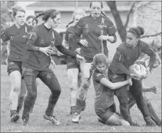  ?? CAROLE MORRIS-UNDERHILL ?? Morgan Rogers, from Chester, passes the ball back to her KES teammates as she’s being tackled. Pictured behind her, from left, are: Tea Racozzi, Amy Marchand-Dion, and Johanna Grosse in support.
