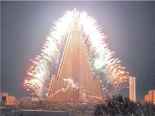  ??  ?? EMPTY GESTURE: The 105-storey Ryugyong Hotel is the world’s tallest incomplete­d building.