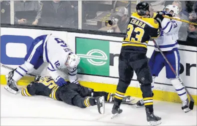  ?? CP PHOTO ?? The Toronto Maple Leafs will have Nazem Kadri, shown here dealing with the Boston Bruins’ Zdeno Chara following a dirty hit on Tommy Wingels in Game 1, back in the lineup tonight following a three-game suspension as a result of the Wingels hit.