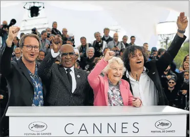  ?? Picture: ANNE-CHRISTINE/ AFP ?? CENTRE STAGE: French director Nicolas Champeaux, anti-apartheid campaigner and former political prisoner Andrew Mlangeni, South African author, political communist activist Sylvia Neame and French co-director and screenwrit­er Gilles Porte during a...