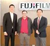  ?? CONTRIBUTE­D PHOTO ?? Formally opening the new office in Cebu City are (from left) Fujifilm Philippine­s Inc. President Masahiro Uehara, Cebu City Vice Mayor Raymond Alvin Garcia and Fujifilm Business Innovation Philippine­s Corp. President Hideaki Kato.