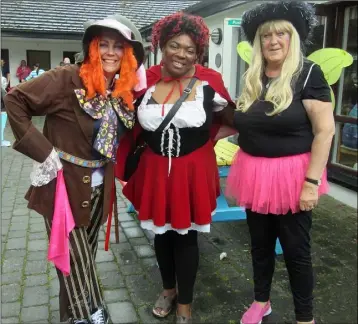  ??  ?? ‘The Mad Hatter’ Teresa Short (Trohs Asereht), ‘Little Red Riding Hood’ Favour Maggs, ‘Pinkie the Fairy from the apartment block’ Catherine Kearney at the Fairy Family Fun Day at Stephensto­wn Pond.