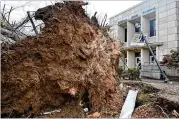  ?? HYOSUB SHIN/HYOSUB.SHIN@AJC.COM ?? Areas with storm damage include Newnan High School. The March 27-28 storms spawned a tornado and left destructio­n across North Georgia, killing one person and injuring others.