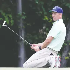  ?? BILL STREICHER/USA TODAY SPORTS ?? Brendon Todd entered Sunday’s final round at the Travelers Championsh­ip leading the field, but crashed to Earth with a disastrous triple-bogey on the 12th hole. Meanwhile, Canada’s Mackenzie Hughes finished in a tie for third behind winner Dustin Johnson.