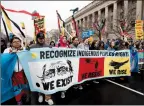 ?? AP FILE PHOTO ?? Protestors march in Washington in March against the disputed Dakota Access pipeline. Tribes representi­ng tens of thousands of indigenous people on both sides of the U.S.-Canada border are signing a declaratio­n against the planned Keystone XL pipeline.
