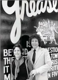  ?? (AP file/Marty Reichentha­l) ?? Theatrical producers Kenneth Waissman (right) and Maxine Fox pose outside the Royale Theatre in New York on Oct. 23, 1979. The couple produced the musical “Grease,” which had been playing on Broadway since 1972.