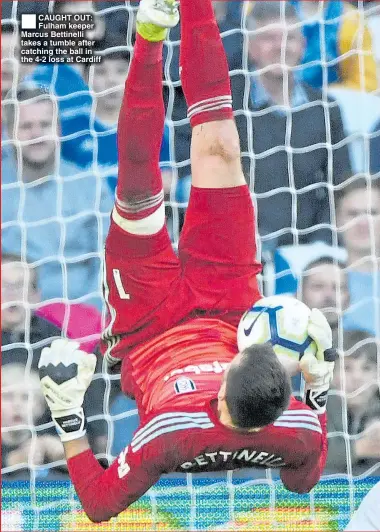  ??  ?? CAUGHT OUT: Fulham keeper Marcus Bettinelli takes a tumble after catching the ball in the 4-2 loss at Cardiff