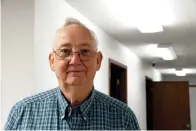  ?? The Sentinel-Record/Lance Brownfield ?? ■ Clarence Durand, manager of the Hot Springs Duplicate Bridge Club, gets ready for a game Thursday at noon.