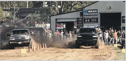  ??  ?? It was definitely a winning weekend for Dustin Mccandless and his classic body Chevy (right). After picking up the Street class win in the dirt drags, he took home First Place in both the Work Stock and Open/run What Ya Brung class during the sled pulls. Dustin’s Work Stock victory entailed his Duramax going 371.61 feet with an impressive ground speed of 29.4 mph.