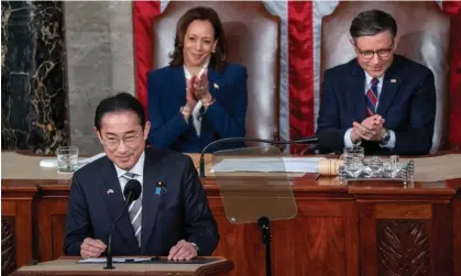  ?? Photograph: Shawn Thew/EPA ?? Fumio Kishida, prime minister of Japan, delivers an address to Congress as Kamala Harris and Mike Johnson listen.