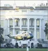  ?? J. SCOTT APPLEWHITE — THE ASSOCIATED PRESS ?? Marine One lifts off from the White House to carry President Donald Trump to Walter Reed National Military Medical Center in Bethesda, Md., Friday in Washington. The White House says Trump will spend a “few days” at the military hospital after contractin­g COVID-19.