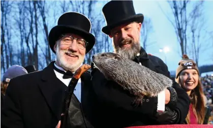  ?? Photograph: Alan Freed/Reuters ?? Punxsutawn­ey Phil and his two handlers in February.