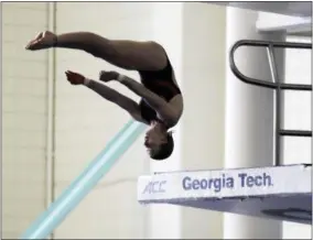  ?? DAVID GOLDMAN — THE ASSOCIATED PRESS ?? In this Friday photo, Tarrin Gilliland takes a practice dive during the U.S. Diving Synchroniz­ed National Championsh­ips at Georgia Tech in Atlanta. These days, the pool deck seems a little empty for the U.S. diving team as David Boudia, the stalwart of...