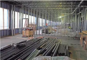  ?? RICK WOOD / MILWAUKEE JOURNAL SENTINEL ?? Science classrooms and technology rooms are being built with expansive window views. The school will include regulation-size indoor and outdoor soccer fields and swimming pools.