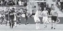  ?? MATIAS J. OCNER mocner@miamiheral­d.com ?? Inter Miami forward Gonzalo Higuain reacts toward the referee after New England scored the second goal of the Revolution’s 5-0 victory Wednesday