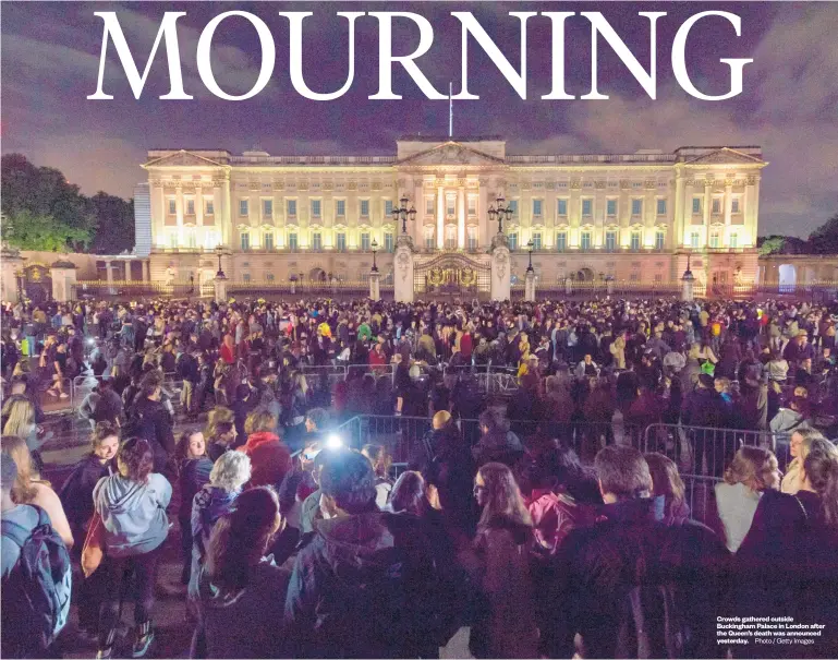  ?? Photo / Getty Images ?? Crowds gathered outside Buckingham Palace in London after the Queen’s death was announced yesterday.