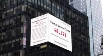  ??  ?? The Trump Death Clock created by film maker Eugene Jarecki keeps watch over Time Square in New York City. File photo