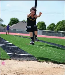  ?? ANNETTE BEARD NWA MEDIA ?? Prairie Grove’s Braden Riesner competes in the triple jump during the 4A-1 Track and Field Conference meet hosted by Pea Ridge April 25.